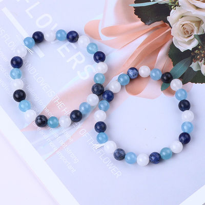 Un bracelet en quartz clair / sodalite / calcédoine bleue 8 mm en cristal à perles d'énergie positive