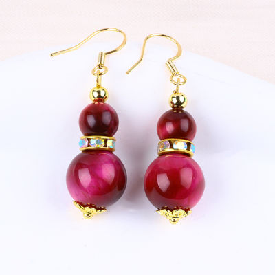 Des boucles d'oreilles en cristal de quartz suspendu en perles de pierre précieuse de 10 mm OEM ODM