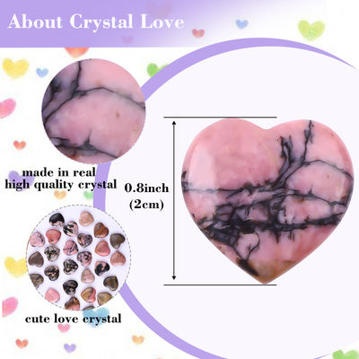 Des cristaux en forme de cœur glacés de rhodonite pour équilibrer les chakras