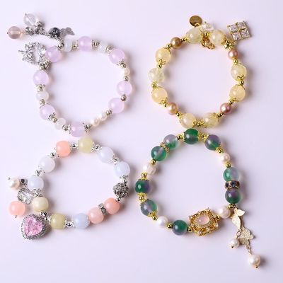 Des bracelets personnalisés en pierre de cristal de 10 mm avec une énergie curative.