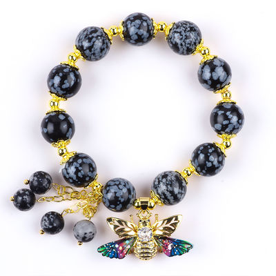 Bracelet à perles en pierre précieuse fait à la main, en flocons de neige, à charmes réglables, pour les fêtes.