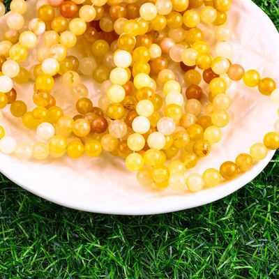 Jade jaune foncé Perle ronde pierre précieuse de cristal naturel Perle de taille différente Franges de perles lâches pour la fabrication de bijoux bricolage