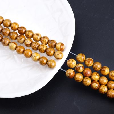 Perles rondes de bois jaune de grain de cristal naturel de pierre précieuse de bois de jaspe de perles lâches pour la fabrication de bijoux
