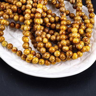 Perles rondes de bois jaune de grain de cristal naturel de pierre précieuse de bois de jaspe de perles lâches pour la fabrication de bijoux