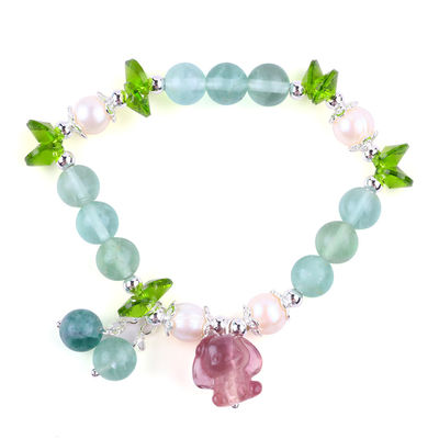 Fluorite de pierre semi-précieuse de 8 mm avec un bracelet à rayures en pourpre