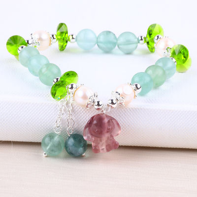 Fluorite de pierre semi-précieuse de 8 mm avec un bracelet à rayures en pourpre