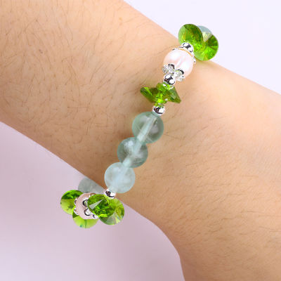 Fluorite de pierre semi-précieuse de 8 mm avec un bracelet à rayures en pourpre