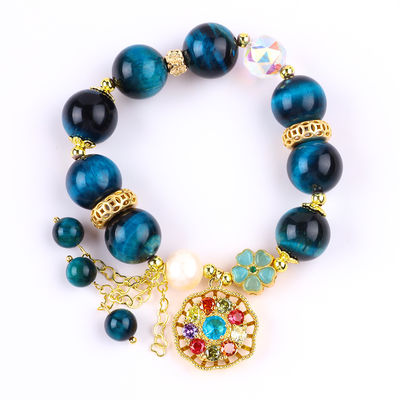 14 mm de cristal de guérison énergétique bleu œil de tigre fleur spinner charme perle bracelet pour le port quotidien