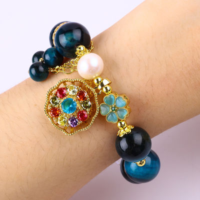14 mm de cristal de guérison énergétique bleu œil de tigre fleur spinner charme perle bracelet pour le port quotidien