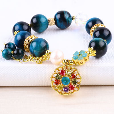 14 mm de cristal de guérison énergétique bleu œil de tigre fleur spinner charme perle bracelet pour le port quotidien