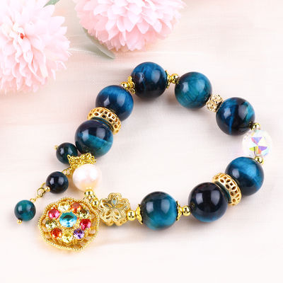 14 mm de cristal de guérison énergétique bleu œil de tigre fleur spinner charme perle bracelet pour le port quotidien