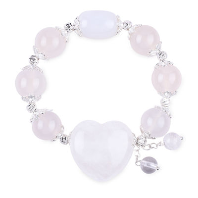 Une pierre précieuse de guérison énergétique Agate blanche avec un bracelet à cœur clair