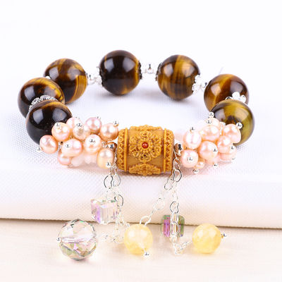 Une perle d'eau douce naturelle de 14 mm avec un magnifique bracelet en perles.