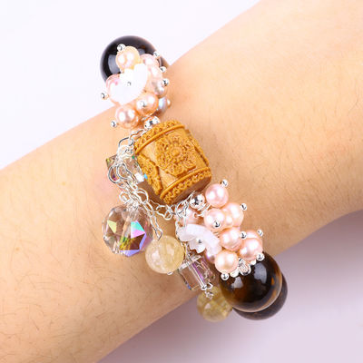 Une perle d'eau douce naturelle de 14 mm avec un magnifique bracelet en perles.