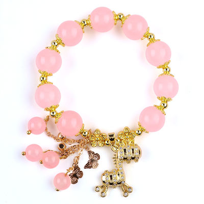 Bracelet en perles de quartz rose 12 mm sur mesure avec charme de cerf