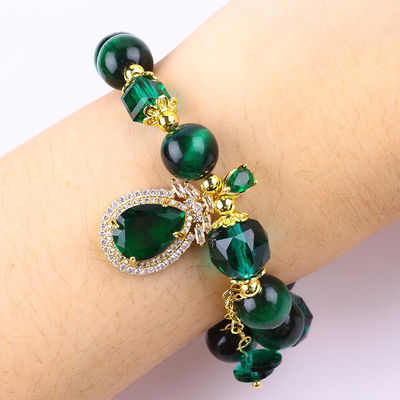 Bracelet vert naturel 10 mm pour les yeux de tigre avec plaque d'or de cuivre