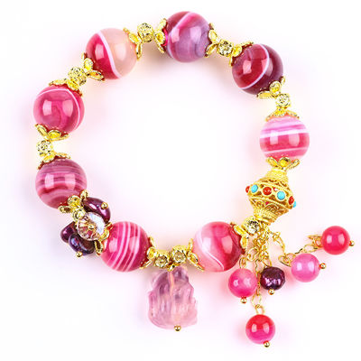 Bracelet en pierre d'agate rose de 14 mm avec sculpture de renard à neuf queues violette