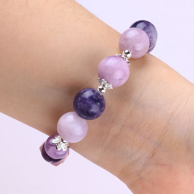 Le bracelet de 14 mm violet porte la fortune