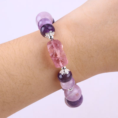 Le bracelet de 14 mm violet porte la fortune