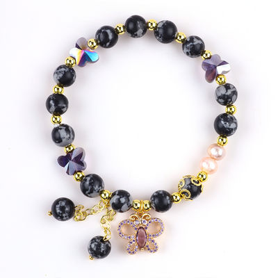 8 mm de pierre naturelle de guérison, flocon de neige, obsidienne avec un bracelet en perles de papillon violet.
