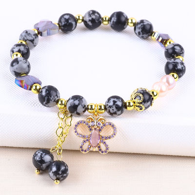 8 mm de pierre naturelle de guérison, flocon de neige, obsidienne avec un bracelet en perles de papillon violet.
