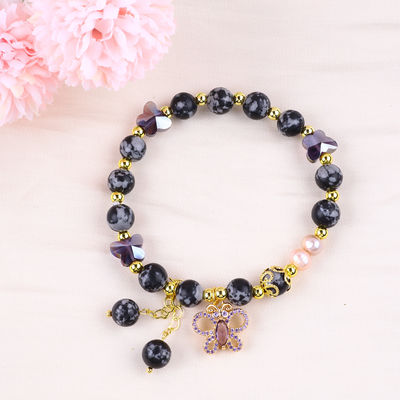 8 mm de pierre naturelle de guérison, flocon de neige, obsidienne avec un bracelet en perles de papillon violet.