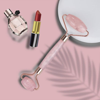 Roller en jade de quartz rose de pierre de cristal pour le traitement du visage / éliminer l'œdème