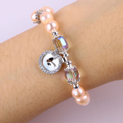 Bracelet rose 7 mm avec coquille blanche Accepter la personnalisation