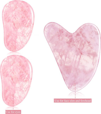 Le cristal rose lissé poli Quartz Gua Sha Jade face de pierre pour l' anti-âge