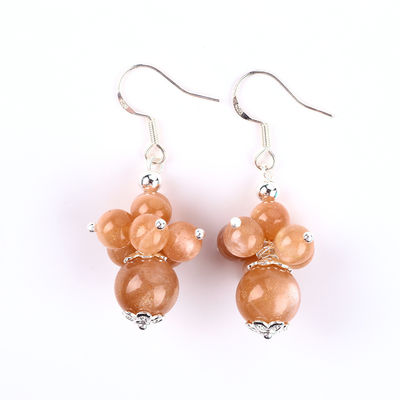 Boucles d'oreilles en pierre de cristal faites à la main Boucles d'oreilles en perles en pierre de soleil Boucles d'oreilles en pendentif en fleurs en pierre précieuse