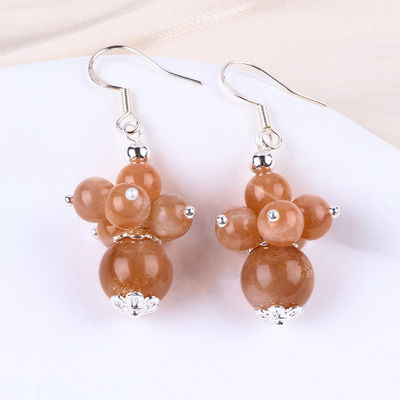Boucles d'oreilles en pierre de cristal faites à la main Boucles d'oreilles en perles en pierre de soleil Boucles d'oreilles en pendentif en fleurs en pierre précieuse