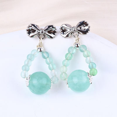 Des boucles d'oreilles en pierre de cristal faites à la main, des boucles d'oreilles en pierre précieuse en fleurite verte, des boucles d'oreilles en arc en perles, des boucles d'oreilles en pendentif.
