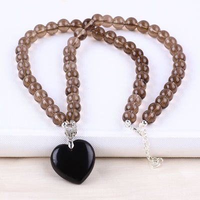 Collier en pierre de cristal en obsidienne noire