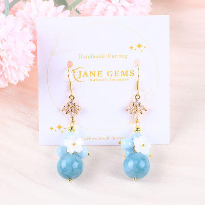 Une boucle d'oreille de perle en forme ronde pour le port quotidien