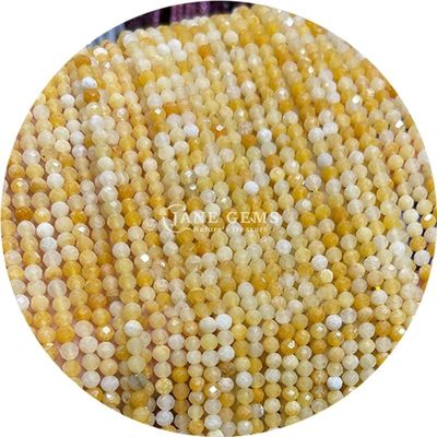 Les perles de pierre naturelle à facettes sont des cristaux semi-précieux en vrac pour la fabrication de bijoux.