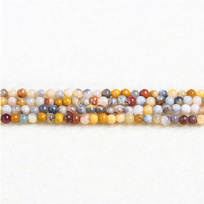 Des perles à l'œil de tigre en cristal naturel, des perles rondes, des perles de dentelle, des perles de pierre précieuse, des perles de guérison pour la fabrication de bijoux.