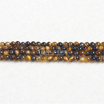 Des perles à l'œil de tigre en cristal naturel, des perles rondes, des perles de dentelle, des perles de pierre précieuse, des perles de guérison pour la fabrication de bijoux.