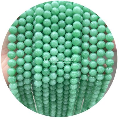 Des perles de pierre de calcédoine de couleur ronde de jade, des perles de pierre naturelle de cristal pour la fabrication de bijoux.