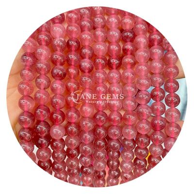 Des perles de pierre de calcédoine de couleur ronde de jade, des perles de pierre naturelle de cristal pour la fabrication de bijoux.