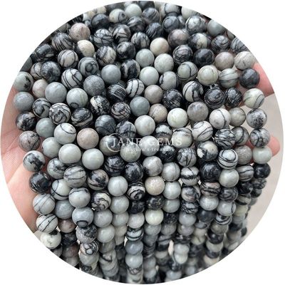 Des perles de pierre précieuse en rhodochrosite à rayures noires naturelles pour les bijoux