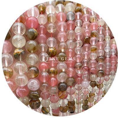 Des perles de pierre précieuse en rhodochrosite à rayures noires naturelles pour les bijoux