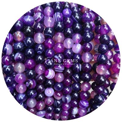 Des perles d'agate de forme ronde polies pour la fabrication de bijoux et d'artisanat