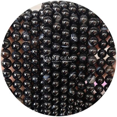 Des perles d'agate de forme ronde polies pour la fabrication de bijoux et d'artisanat