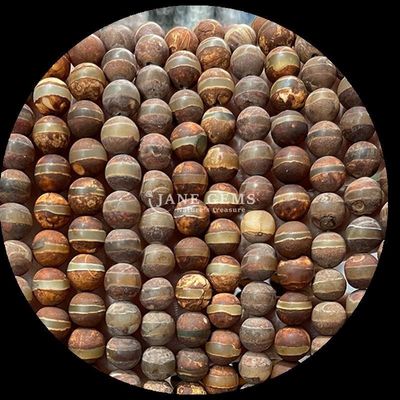 Des perles d'agate tibétaine de forme ronde
