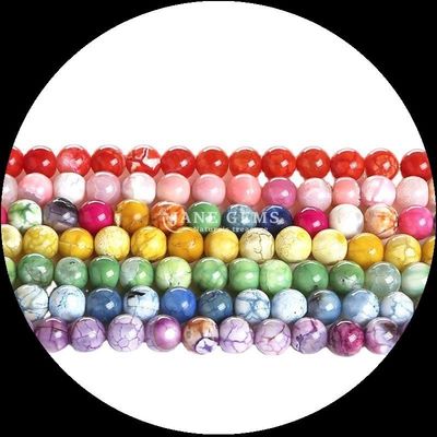 Les pierres précieuses naturelles Perles de coupe ronde Feu Agate Perles en vrac Franges de perles pour les vêtements en perles Décorations faites
