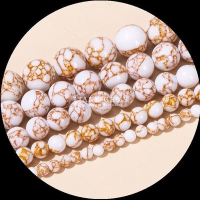 Faites-le vous-même en faisant des perles de pierres précieuses de forme ronde polissées