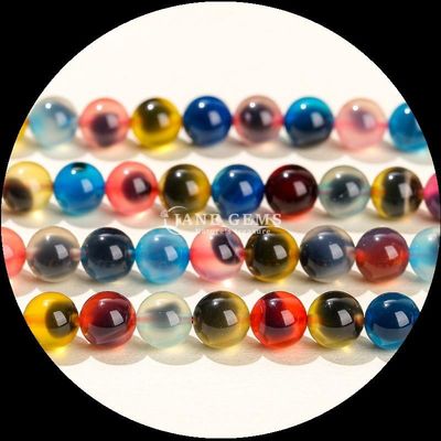 La pierre précieuse naturelle, agate à bandes variées, agate glacée ronde, agate à perles lâches, est l'addition parfaite à votre collection de colliers.