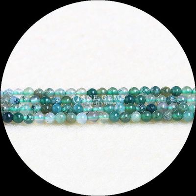 Des perles de pierre précieuse de forme ronde, magnifiques et uniques pour votre collection