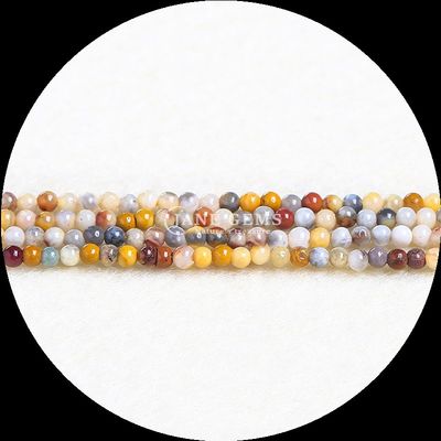 Des perles de pierre précieuse de forme ronde, magnifiques et uniques pour votre collection