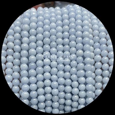 pierre précieuse de forme ronde Howlite Rohdonite pierre cristalline